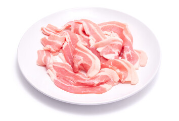 Bacon strips on ceramic plate isolated on white background