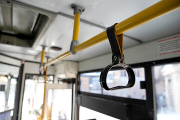 People Hand holding Handle on the train .Clipping path