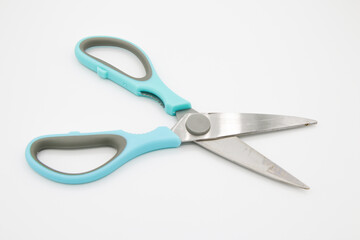 Scissors on the white background