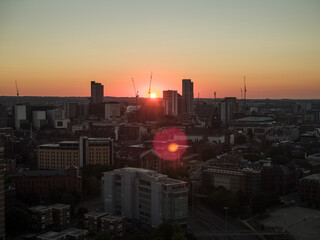 Leeds skyline during a summer sunrise showing Altus House and surrounding buildings and cranes