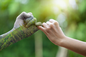 The Promise of Human Fingers and Natural Forests environmental and ecology conservation concept