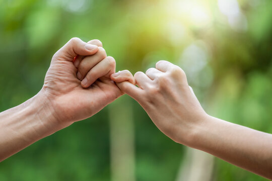 The promise of human beings by interlacing the little finger