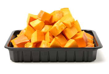 Pumpkin cubes isolated on white background 