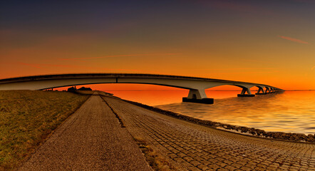 The famous Seeland Bridge in the Netherlands in the fantastic evening light © Lato-Pictures
