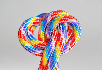 Rainbow colored braided cords tied together