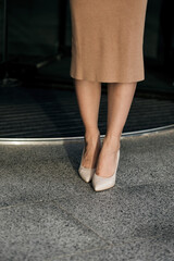 women legs with nude shoes