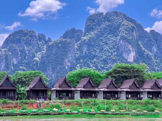 Phangna Bay near the Island of Phuket Thailand. Lovely rock in the middle of the ocean surrounded by mountains