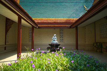 A spinning jade Buddha image in a garden in the ancient city of Samut Prakan Province, Thailand, taken on December 22, 2018. © nopwaratch