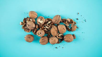 Top view walnuts on blue background