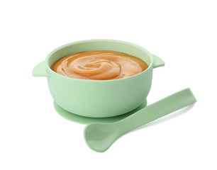 Bowl with tasty pureed baby food and spoon isolated on white