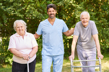 Geriatric nurse caring for senior couple