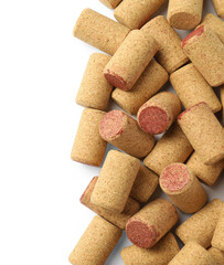 Wine bottle corks on white background, top view