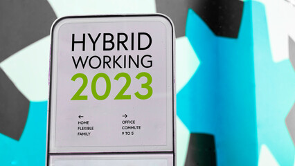 Hybrid Working 2023 with colourful blue city backdrop location	
