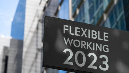 Flexible Working 2023 on a sign outside a modern office building	
