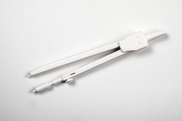 Drawing compass, study and work accessory. White background