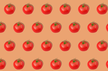Pattern. Red tomatoes on an orange background. Concept of healthy eating. Horizontal orientation.