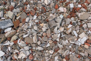 Building demolition demolished ruin stone and bricks rubble debris pieces of material 