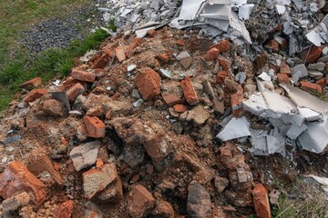 Building demolition demolished ruin stone and bricks rubble debris pieces of material 
