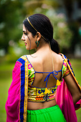 Beautiful Indian woman in traditional chaniya choli for navratri. Navratri is an Indian Festival...