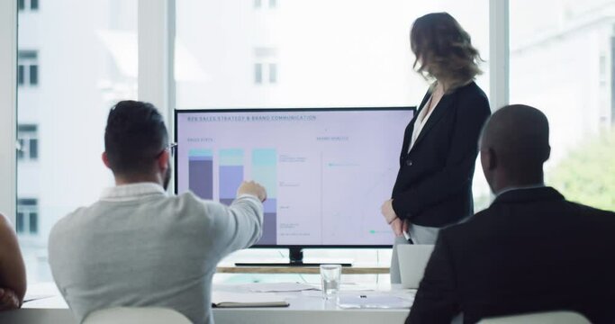 Female entrepreneur in leadership doing presentation on computer about business KPI with bar charts during meeting. Diverse work colleagues discuss company innovation strategy and development vision.