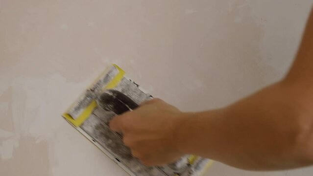 repair wall alignment, wall sanding before painting close-up. High quality FullHD footage