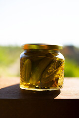 pickled cucumbers in a glass jar