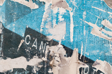Torn street poster background. Abstract, messy, ripped paper poster collage