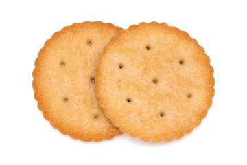 Healthy whole wheat cracker on white background. Stack of Saltine crackers isolated on white background. Round crackers.