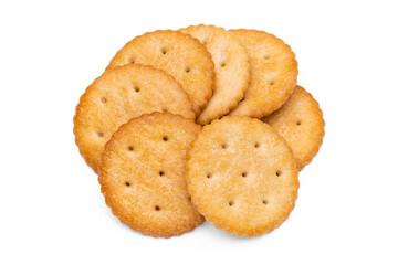 Healthy whole wheat cracker on white background. Stack of Saltine crackers isolated on white background. Round crackers.