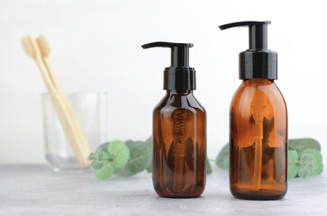 Cosmetic bottles in the bathroom. Skin care product, after shower moisturizer, skin moisturizing lotion