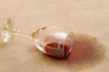 Red wine stain on a carpet inside a living room