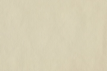 Black bright macro photo of texture of the genuine faux vegan leather. Fashion pattern and background. Leather with embossing.