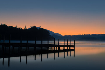 Fototapeta premium Sunrise with Pier and Lake