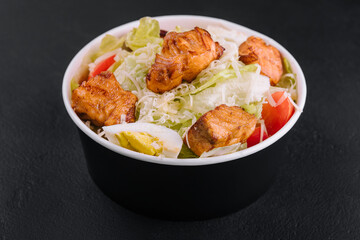 Caesar salad with chicken fillet and parmesan cheese