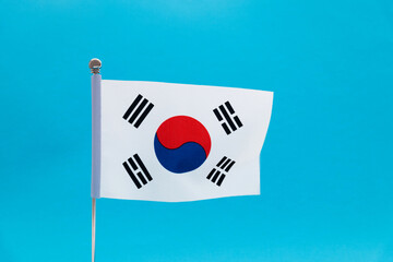 South Korean flag waving on blue background