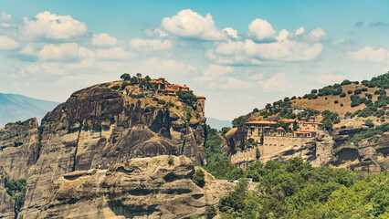 Panoramic bird's eye perspective over Meteora monasteries in Greece. Nature combined with human-built architecture. High quality photo