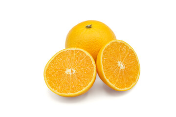 Halved oranges and oranges look fresh appetizing on white background.