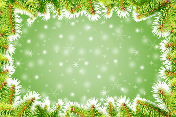 Christmas winter background with a frame of green fir branches on a green background with snowflakes.