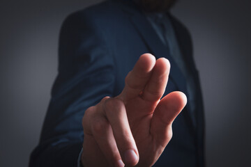 Obraz premium business man presses on touch screen