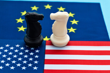 Two knights standing on American flag and EU flag