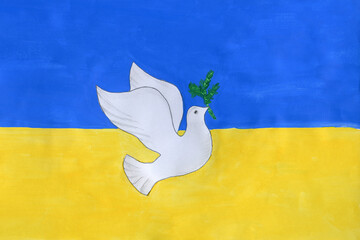 Dove of peace with a green branch against the background of the State national colors-blue and...