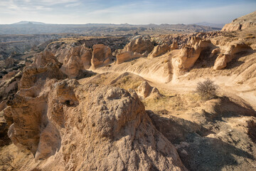 Fototapeta na wymiar Rock formations of Rose Valley in Cappadocia, Turkey.