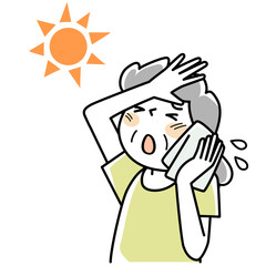 太陽の下で暑さに困っているシニア女性の上半身