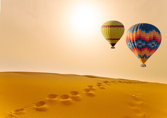 Fototapeta na wymiar Desert and hot air balloon Landscape at Sunrise