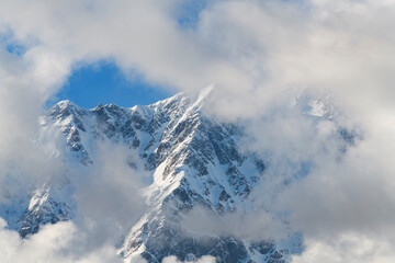 Fototapeta na wymiar High snow covered mountains. Winter mountains landscape