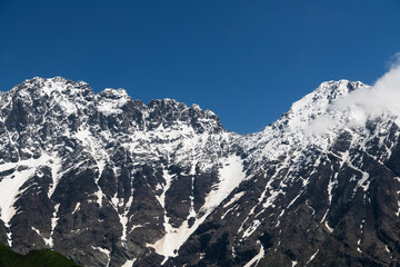 Obraz premium Snow covered mountains in winter. Mountains landscape.
