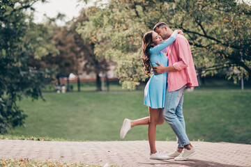 Obraz premium Photo of sweet charming two people together wear casual outfits walking hugging smiling outside garden