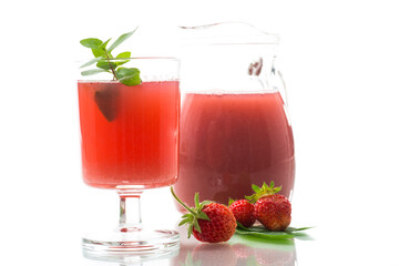 Cold summer strawberry kvass with mint in a glass