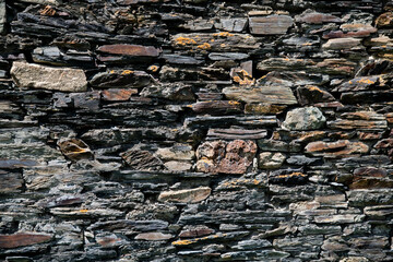 Old natural stone wall. Bricks texture.