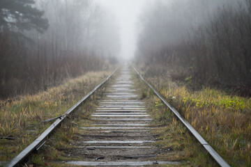 Fototapeta premium Perspective view of an old abandoned railway